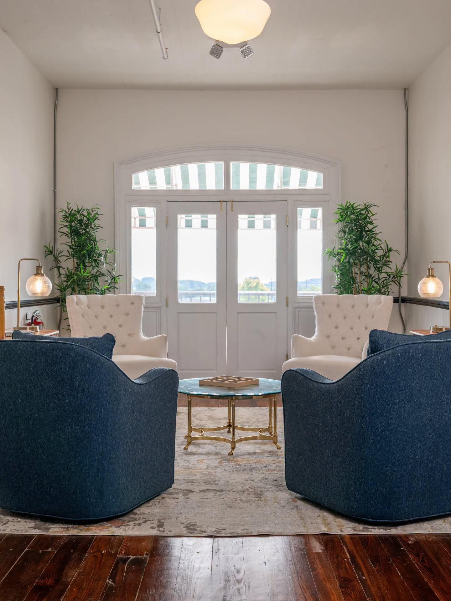 Hattie House lobby with blue and white lounge chairs overlooking downtown